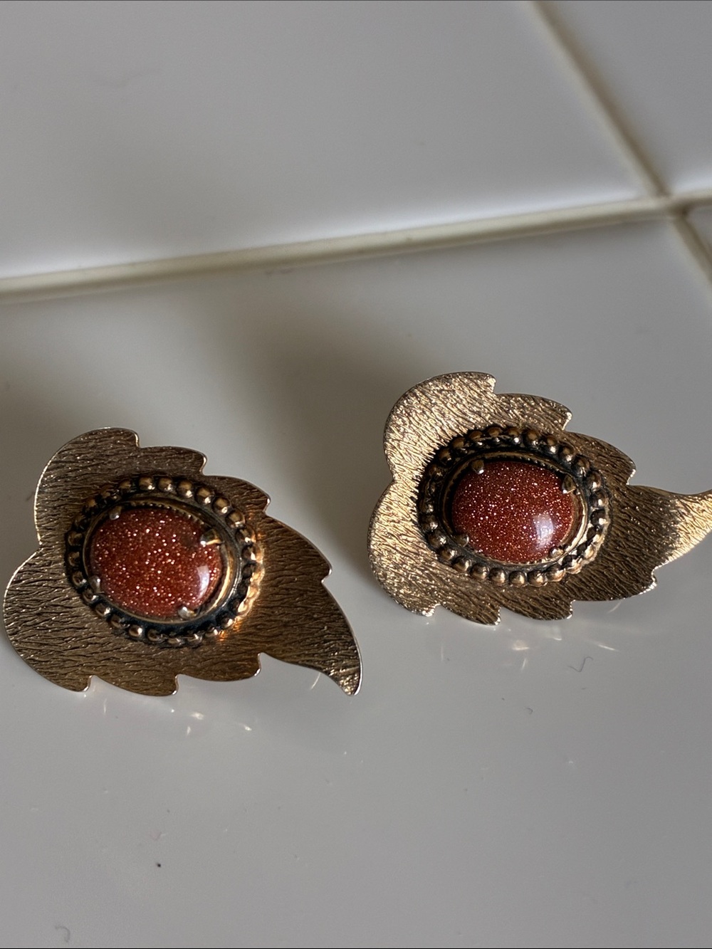 Gold Leaf Clip-On Earrings with Sparkling Brown Stone